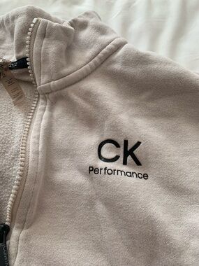 Calvin Klein Beige Sweatshirt with Black CK Performance Logo